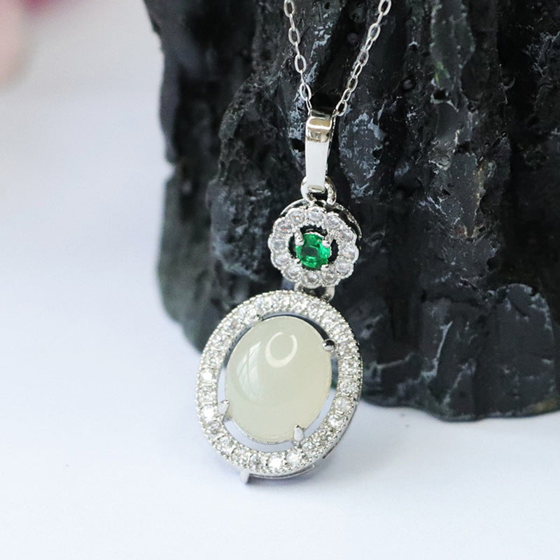 Oval White Jade Pendant with Zircon Halo in Sterling Silver