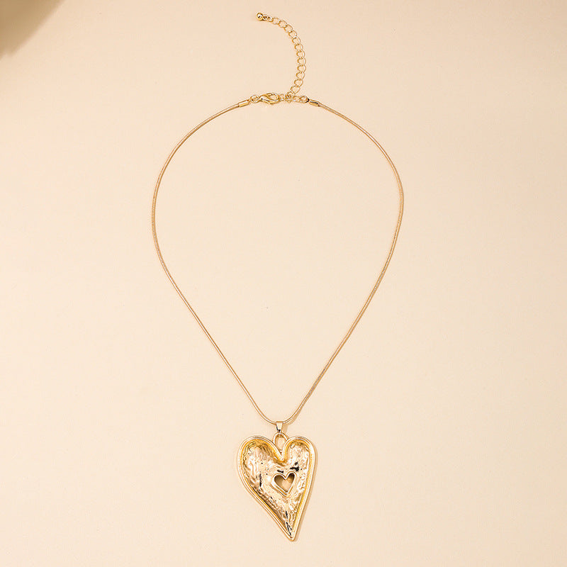 Exaggerated Love Symbol Sweater Chain Necklace with Hollow Pendant