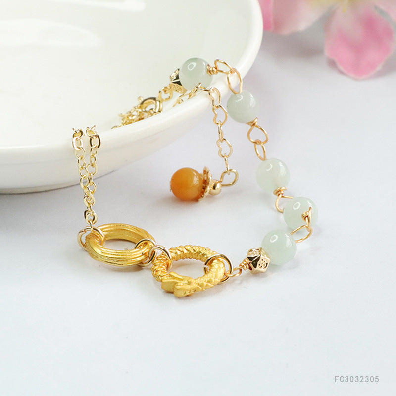 Jadeite Dragon & Phoenix Round Bead Bracelet