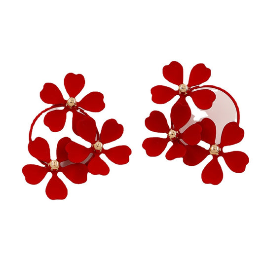 Social Media Star's Trendy Red Floral Earrings - Stylish and Elegant Stud Jewelry from Vienna Verve