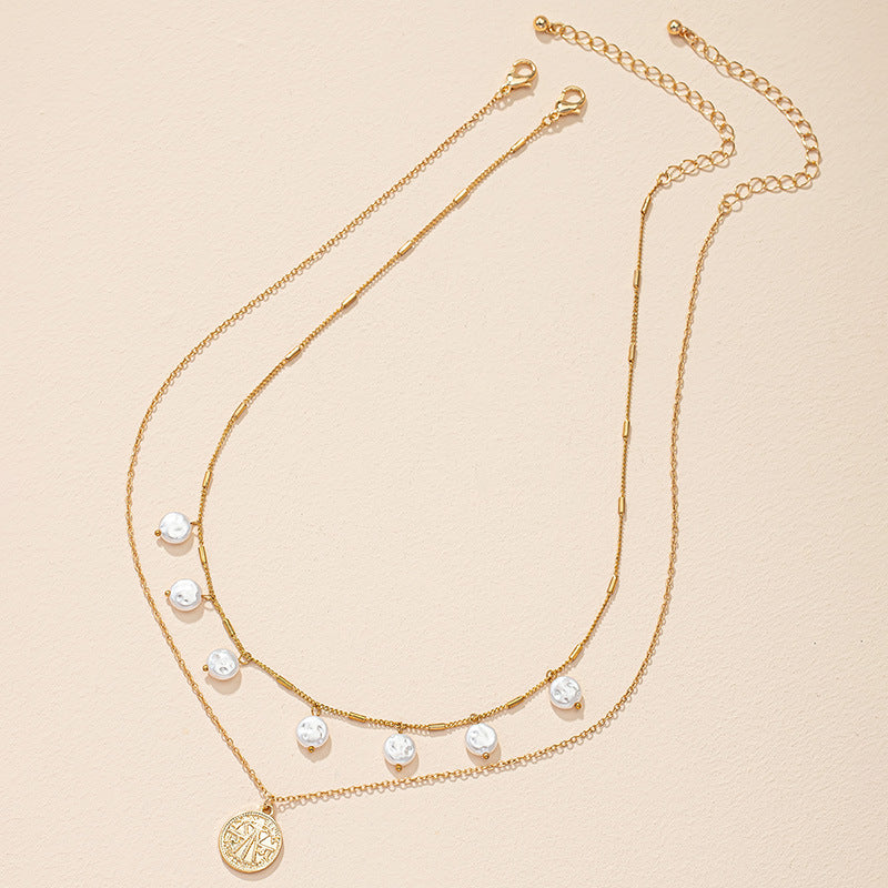 Exquisite Double Layered Pearl Necklace with Light Luxury Gold Chain