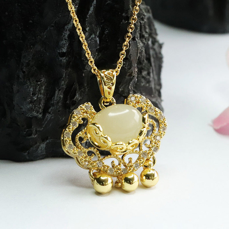 Zircon Ruyi Lock Pendant crafted from Hetian Jade and Sterling Silver