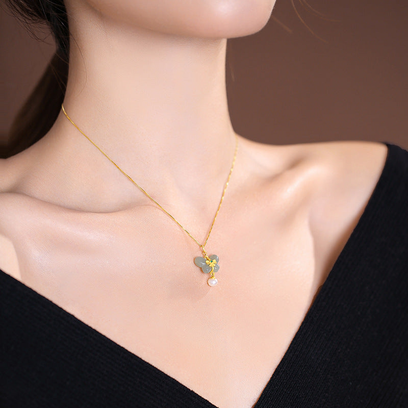 Fortune's Favor: Sterling Silver Necklace with Jade and Pearl Pendant