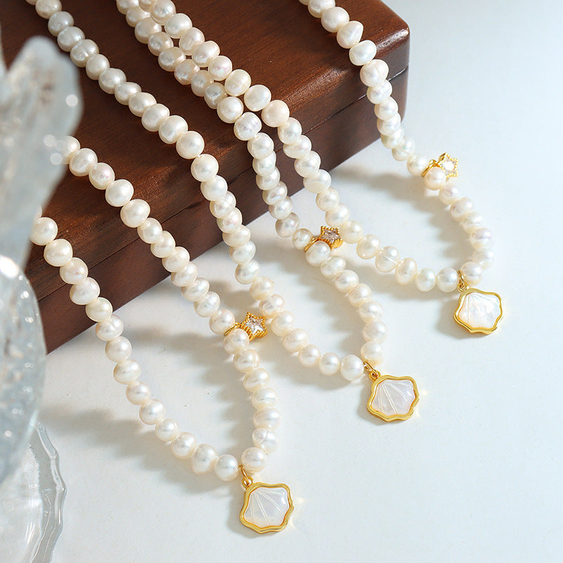 Starlit Freshwater Pearl and Zircon Necklace with Retro Charm