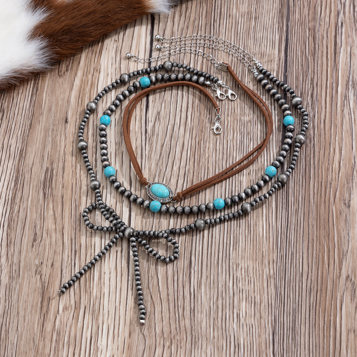 Planderful Vienna Verve Necklace – Handmade Ethnic Turquoise Bow Design