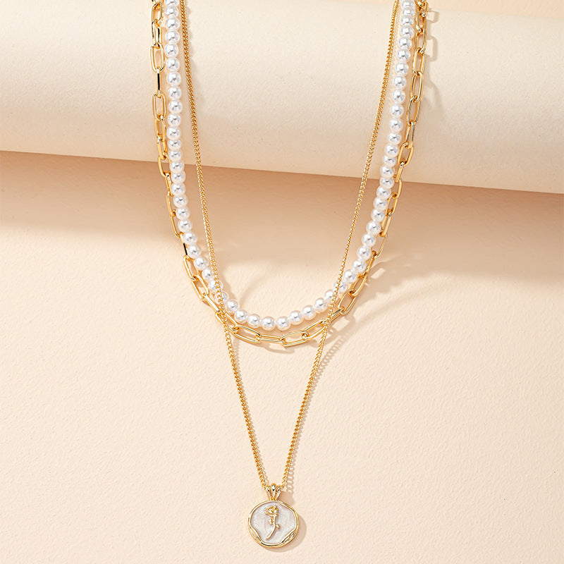 Elegant Pearl Layered Necklace with Floral Tag - Vienna Verve Collection