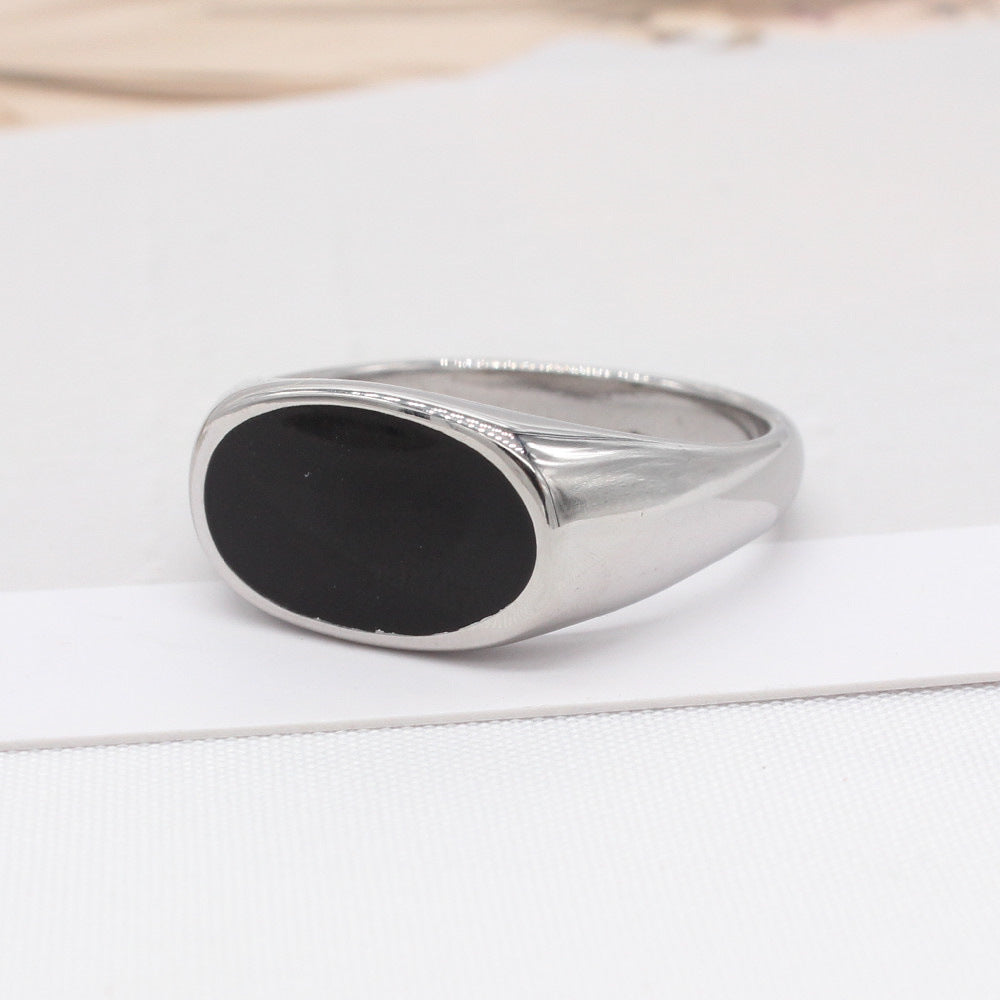Trendy Unisex Oval Titanium Steel Ring in Black and White