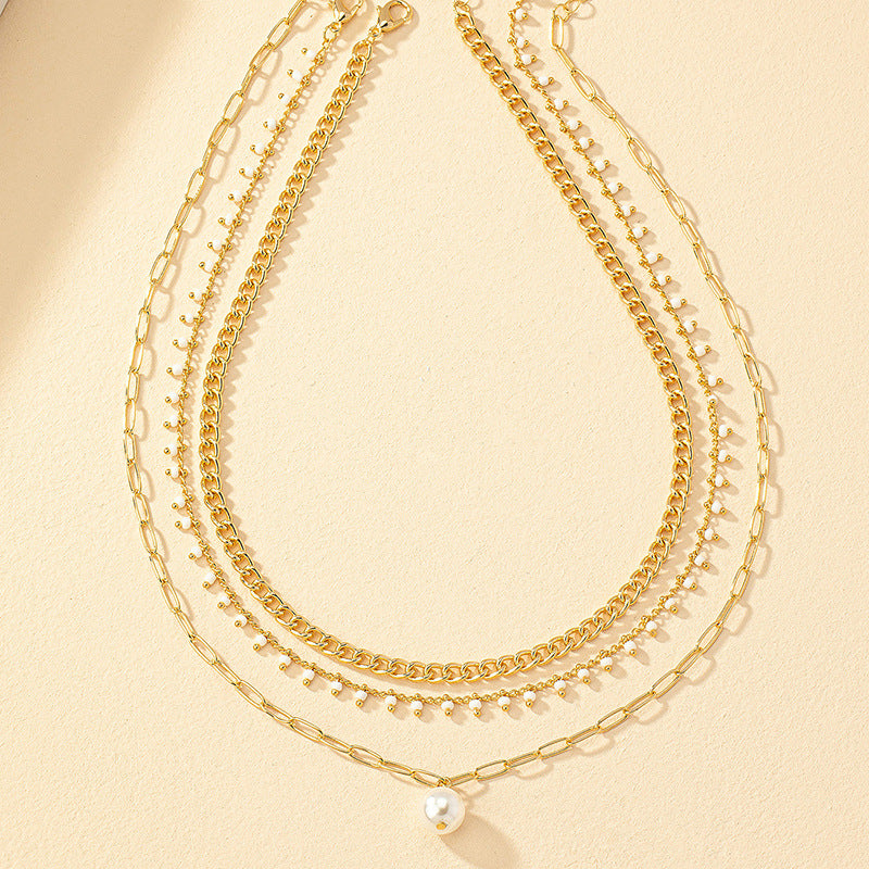 Luxurious Pearl Stacked Necklace Set with Simple Clavicle Chain - Vienna Verve Collection