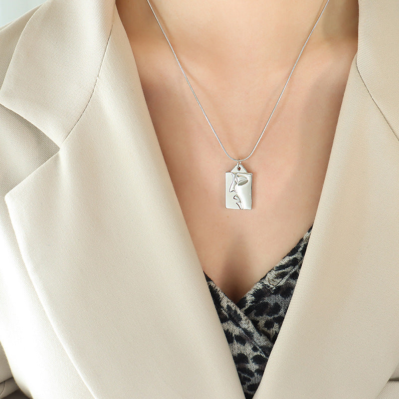 Golden Half-Face Portrait Pendant Necklace with Titanium Plating - European and American Jewelry Trend