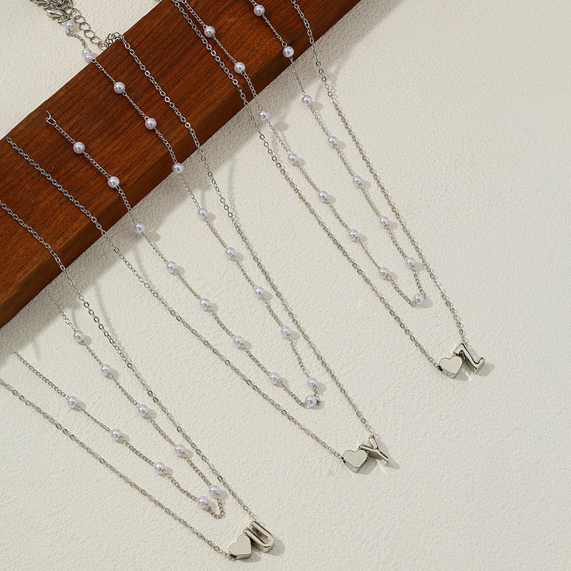 Elegant Pearl Collar Necklace with Metal Love Pendant