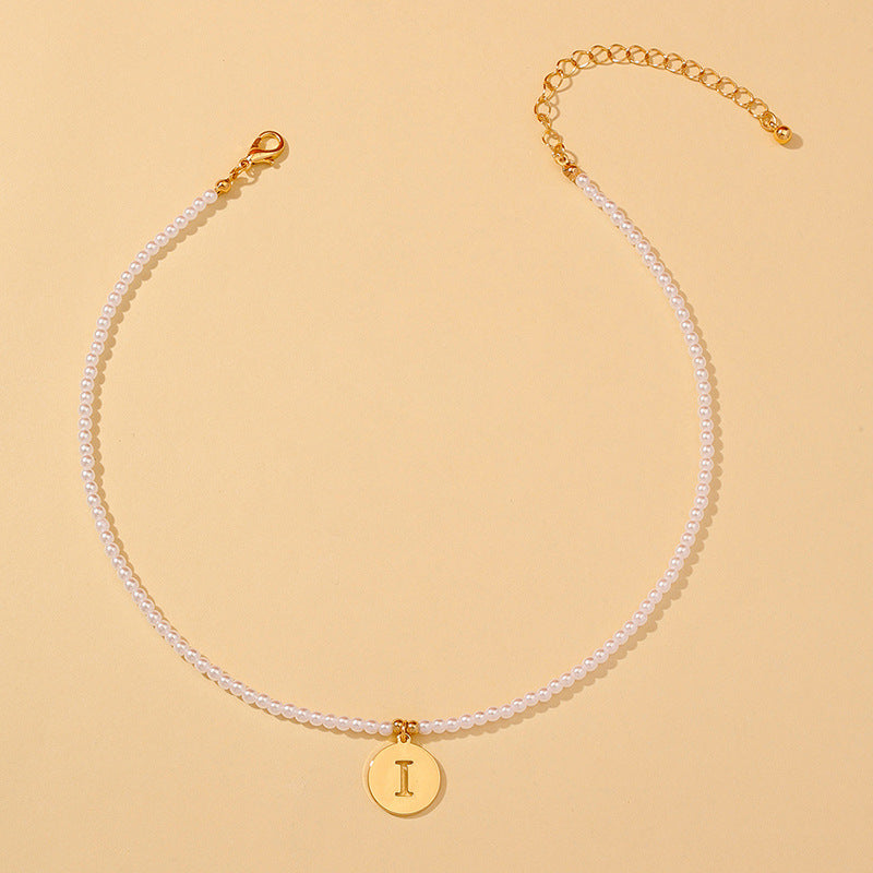 Elegant Hollow English Letter Pendant Necklace with Pearl Accents