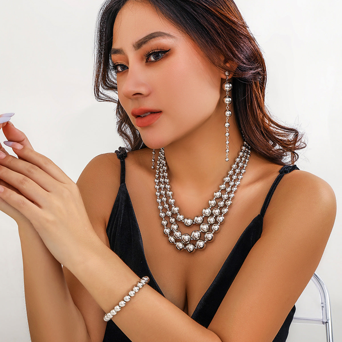 Statement Necklace with Tassel Beads and Geometric Shapes