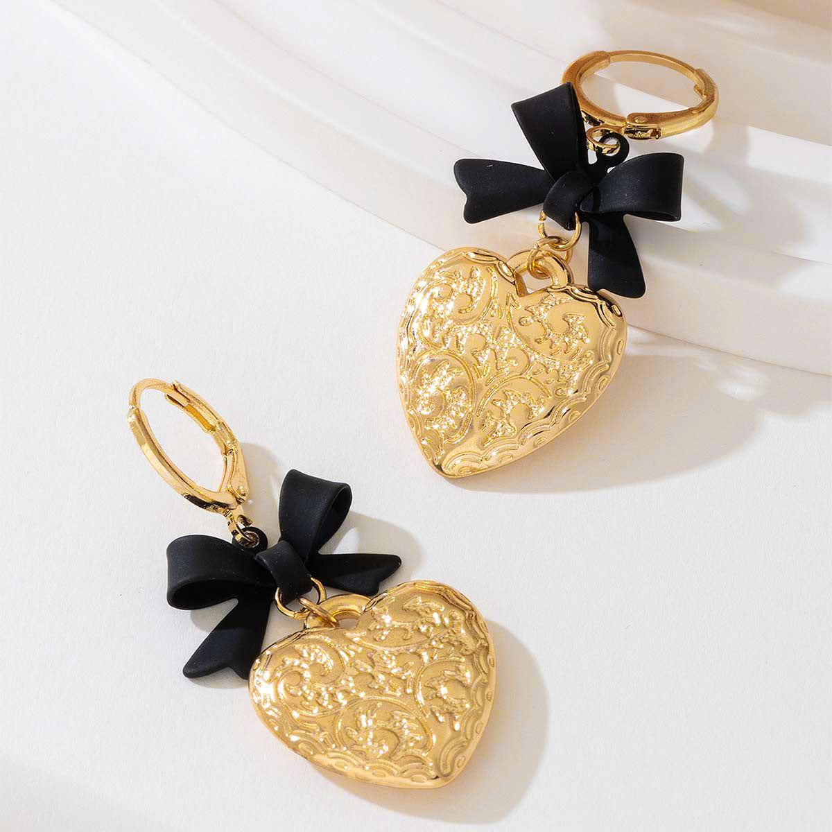 Planderful Vienna Verve Earrings – Elegant Metal Love Bow Design
