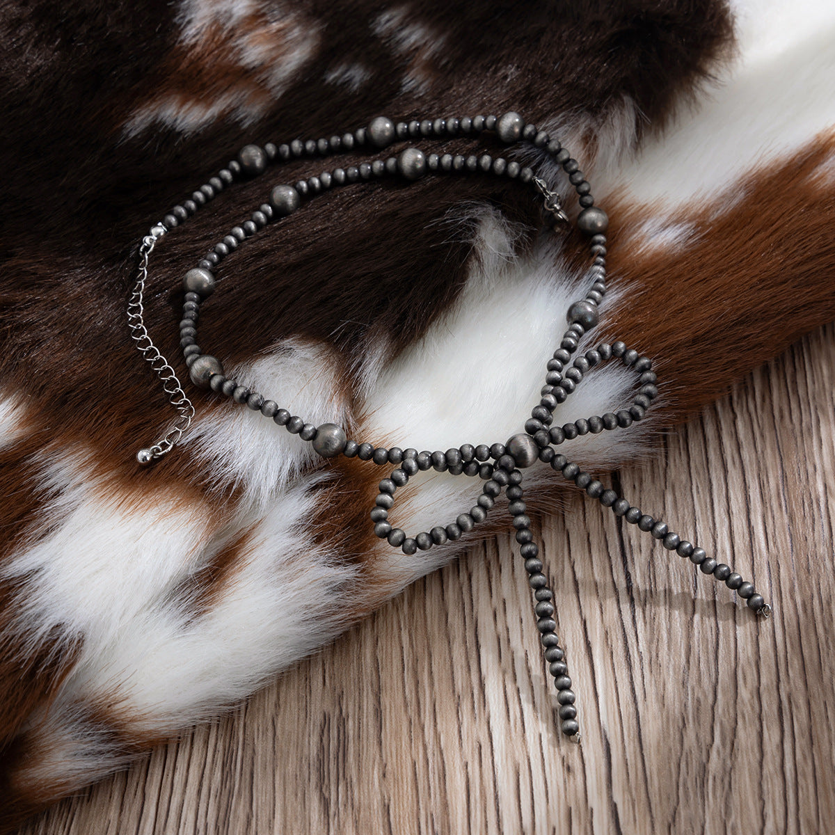 Planderful Vienna Verve Necklace – Handmade Ethnic Turquoise Bow Design