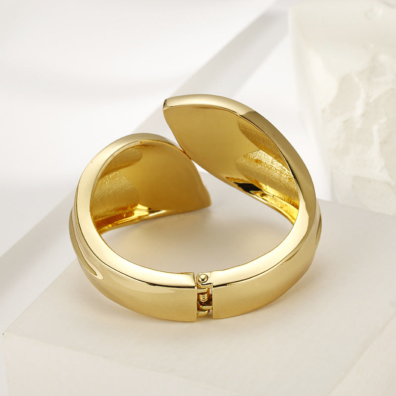 Glossy Gold Leaf Bracelet with Asymmetric Design