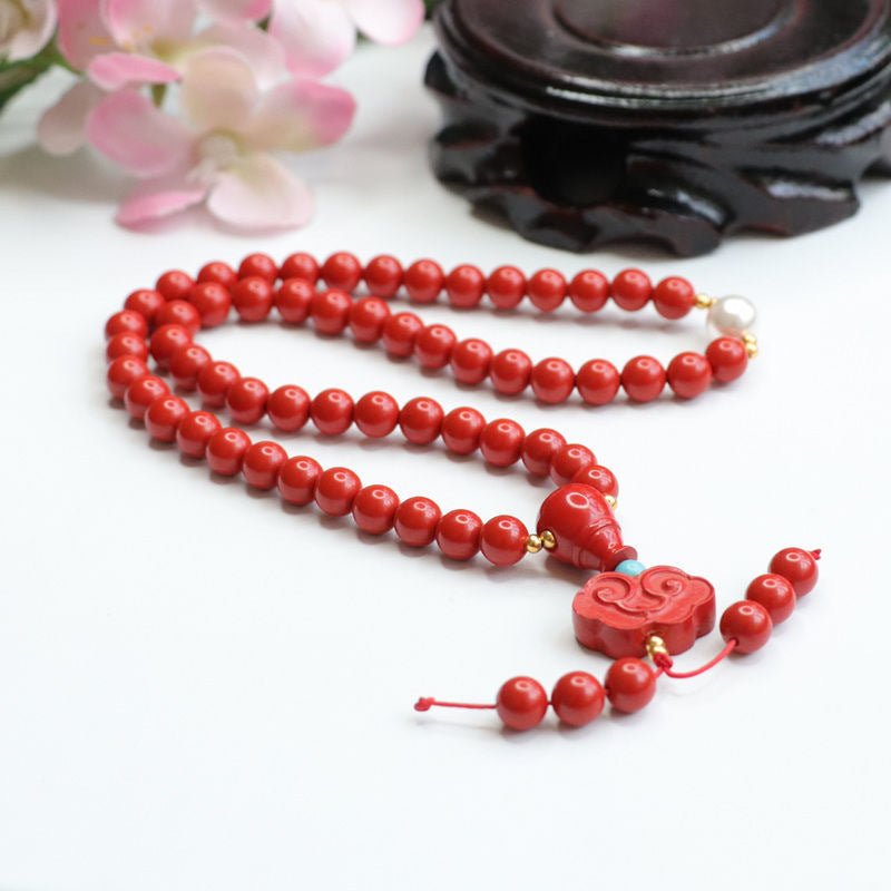 Auspicious Cloud Cinnabar Stone and Pearl Bracelet