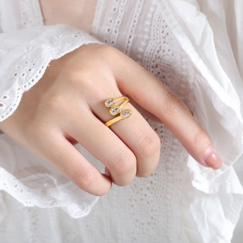 Golden Oval Zircon Hip-Hop Ring with French Flair
