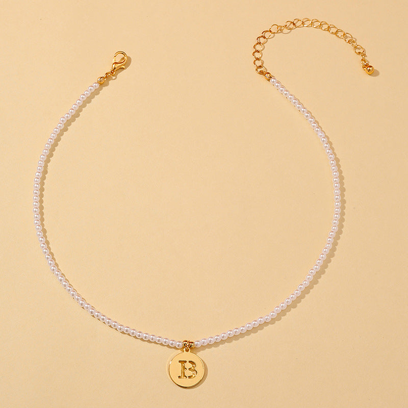 Elegant Hollow English Letter Pendant Necklace with Pearl Accents