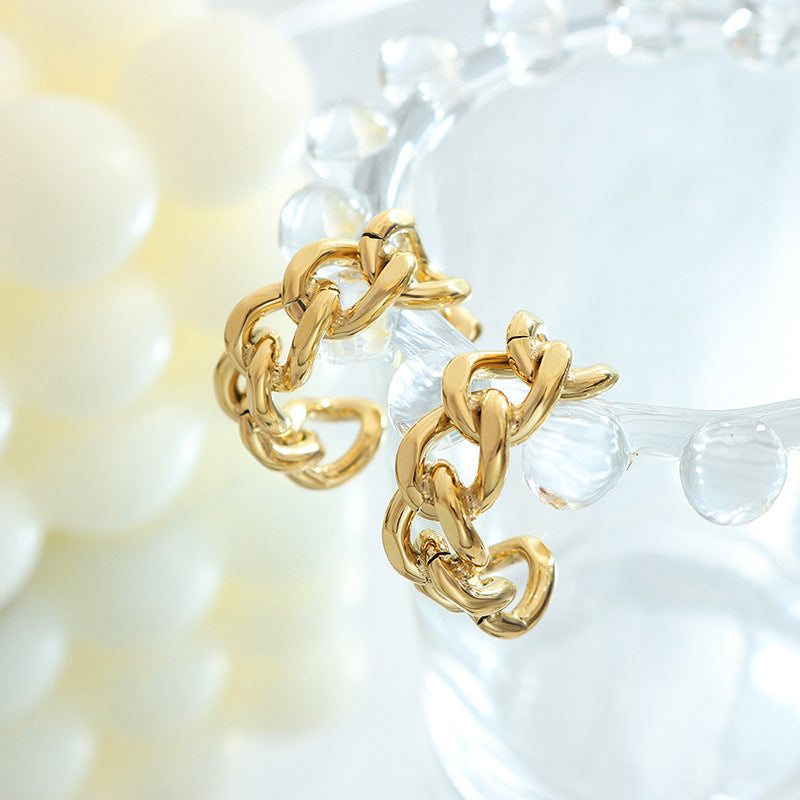 Cold Wind Twist Hollow C-Shaped Gold Earrings - Trendy European Style