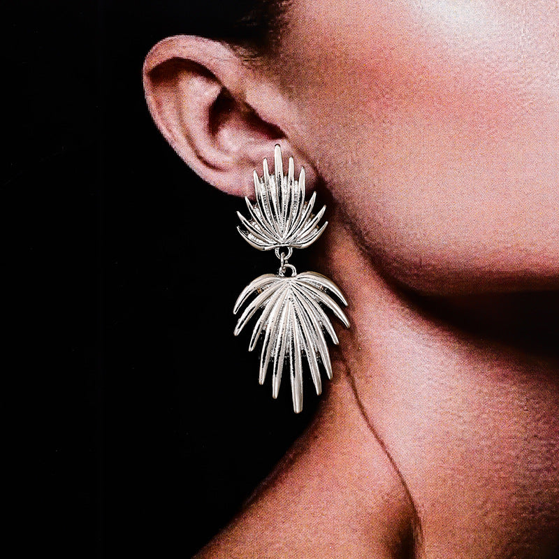 Exaggerated Fan-Shaped Tassel Earrings with Retro Maple Leaf Design