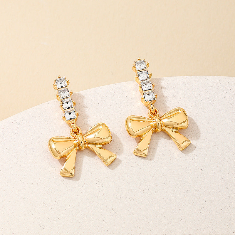 Planderful Vienna Verve Earrings – Charming Metal Bow Design with Dazzling Zircon