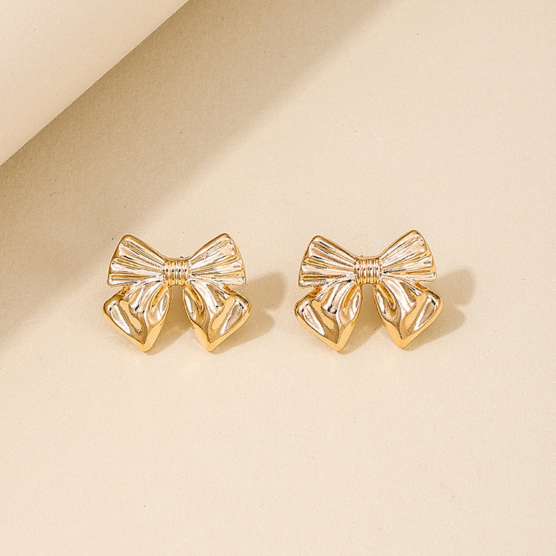 Elegant Vienna Verve Metal Bow Women's Earrings