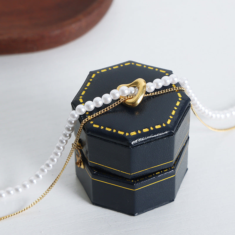 Elegant Handcrafted Pearl Necklace with Retro Charm and Gold Plating