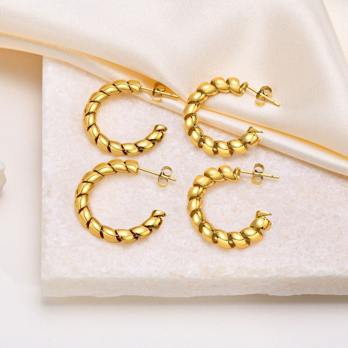 Gold-Tone Twisted Ribbon Open Hoop Earrings