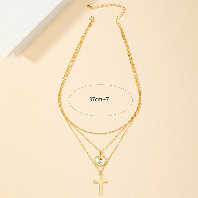 Elegant Layered Cross Pendant Necklace in Modern Style