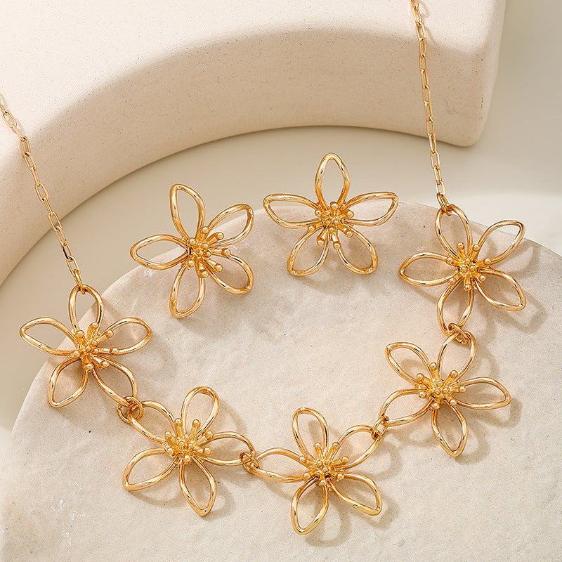 Elegant Women's Metal Lines Flower Jewelry Set by Planderful