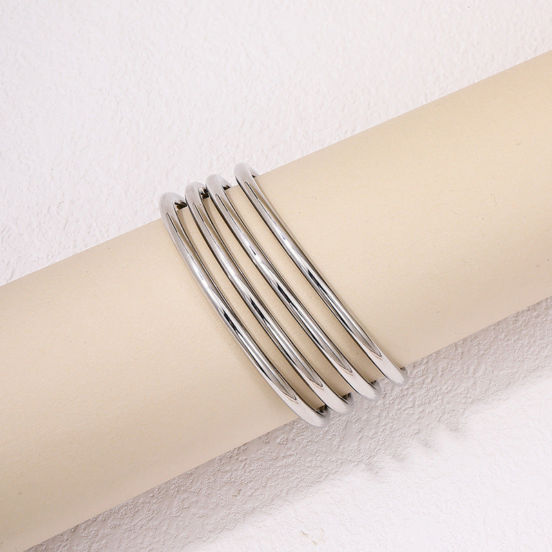 Cross-border Elegance: Vienna Verve Metal Coil Bracelet Set