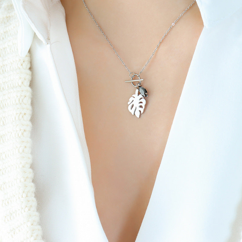 Elegant 18k Gold-Plated Titanium Steel Necklace with Black Zircon Leaf Pendant