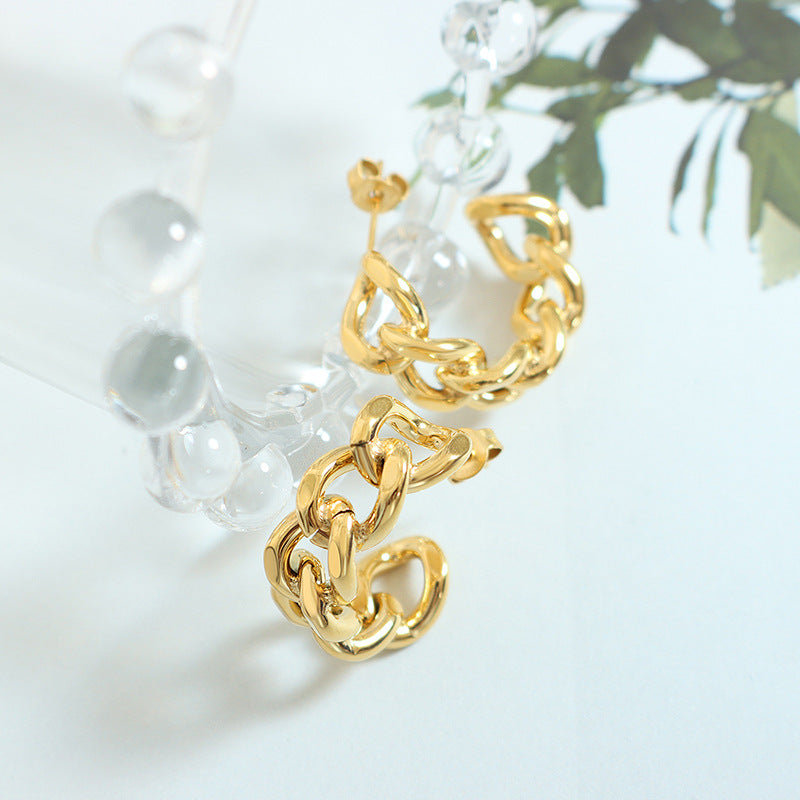 Cold Wind Twist Hollow C-Shaped Gold Earrings - Trendy European Style