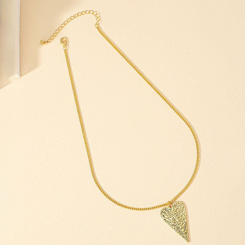 Fashionable Love Pendant Necklace Collection with Unique Pounding Patterns