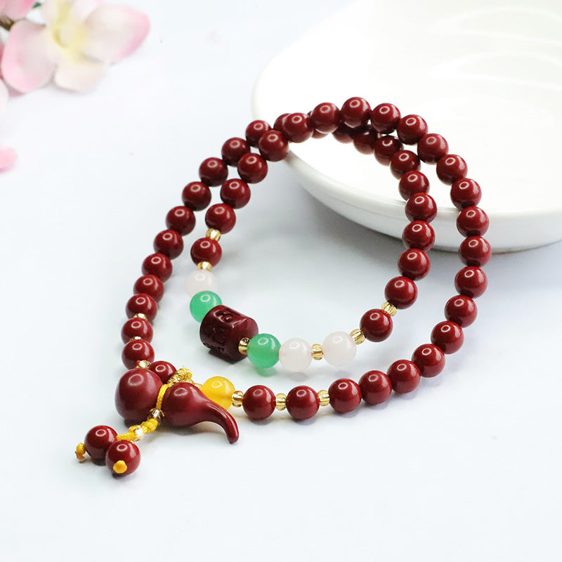 Cinnabar Sterling Silver Hand Bracelet with Multiple Circles and Scripture Bead Gourd