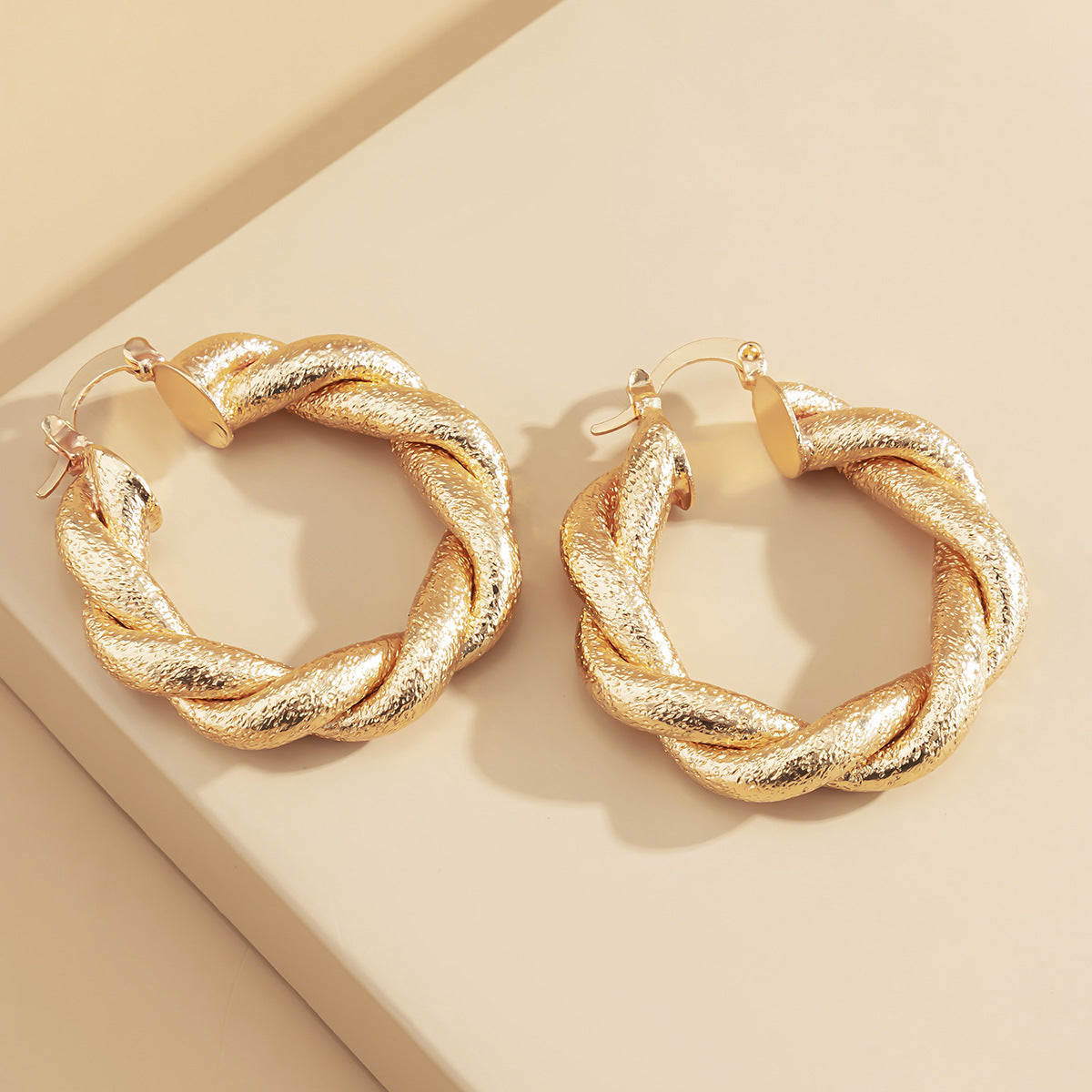 European Style Metal Twisted Earrings with Pockmark Ring