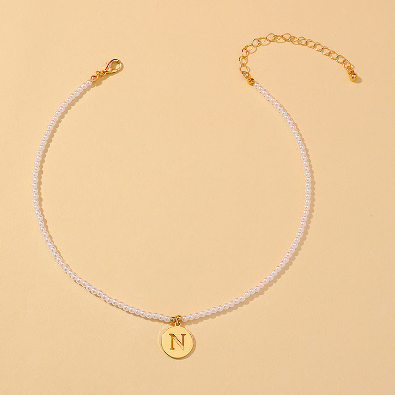 Elegant Hollow English Letter Pendant Necklace with Pearl Accents