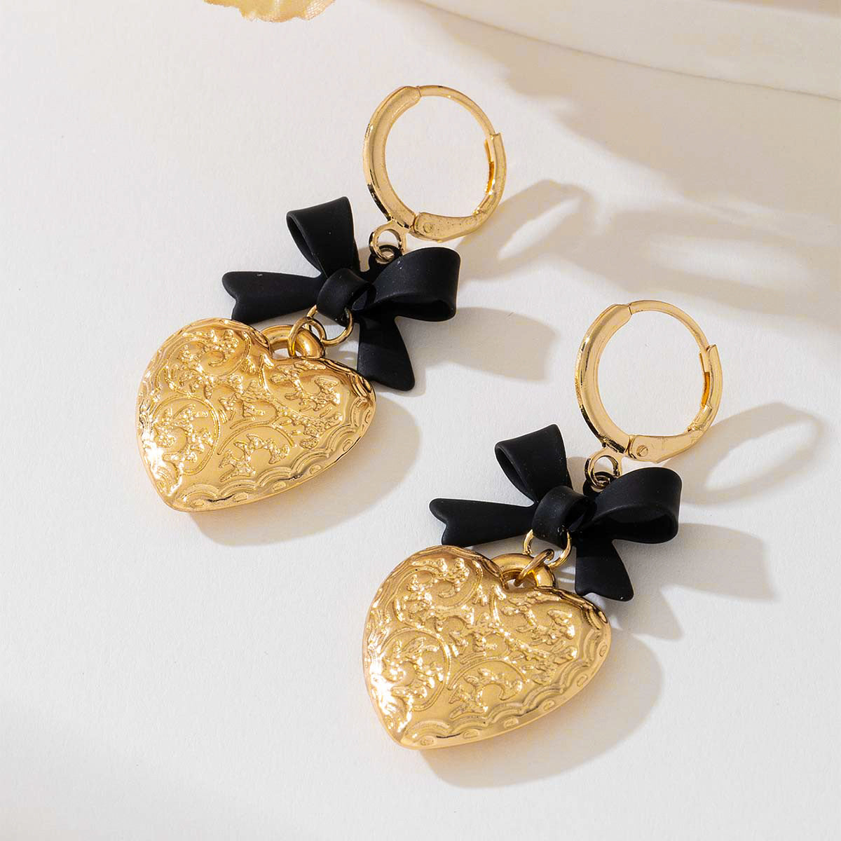 Planderful Vienna Verve Earrings – Elegant Metal Love Bow Design
