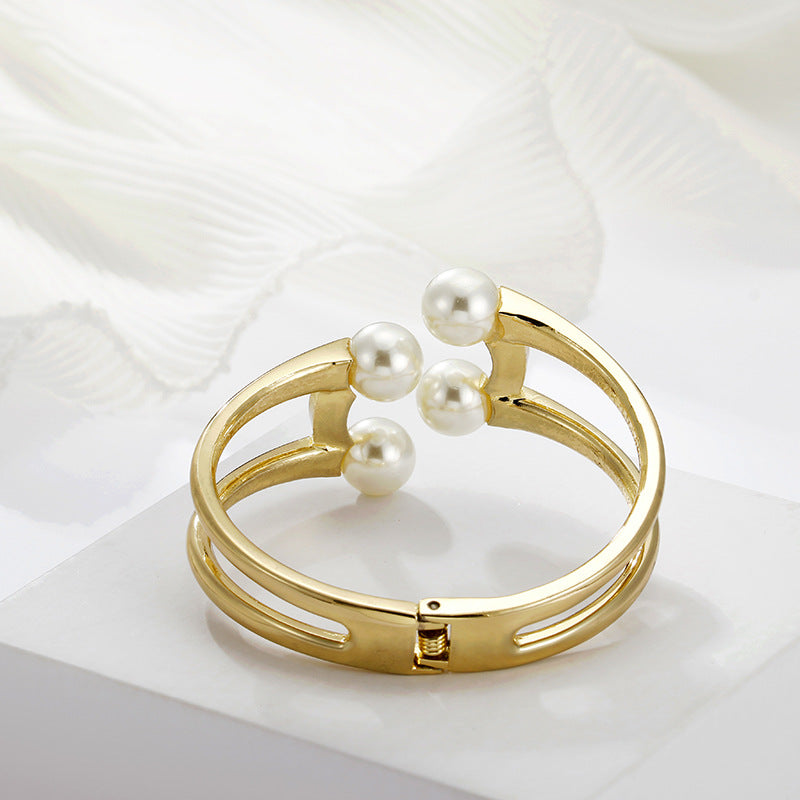 Mystique Pearl Bracelet - Exquisite Metal Bangle with Edgy Charm