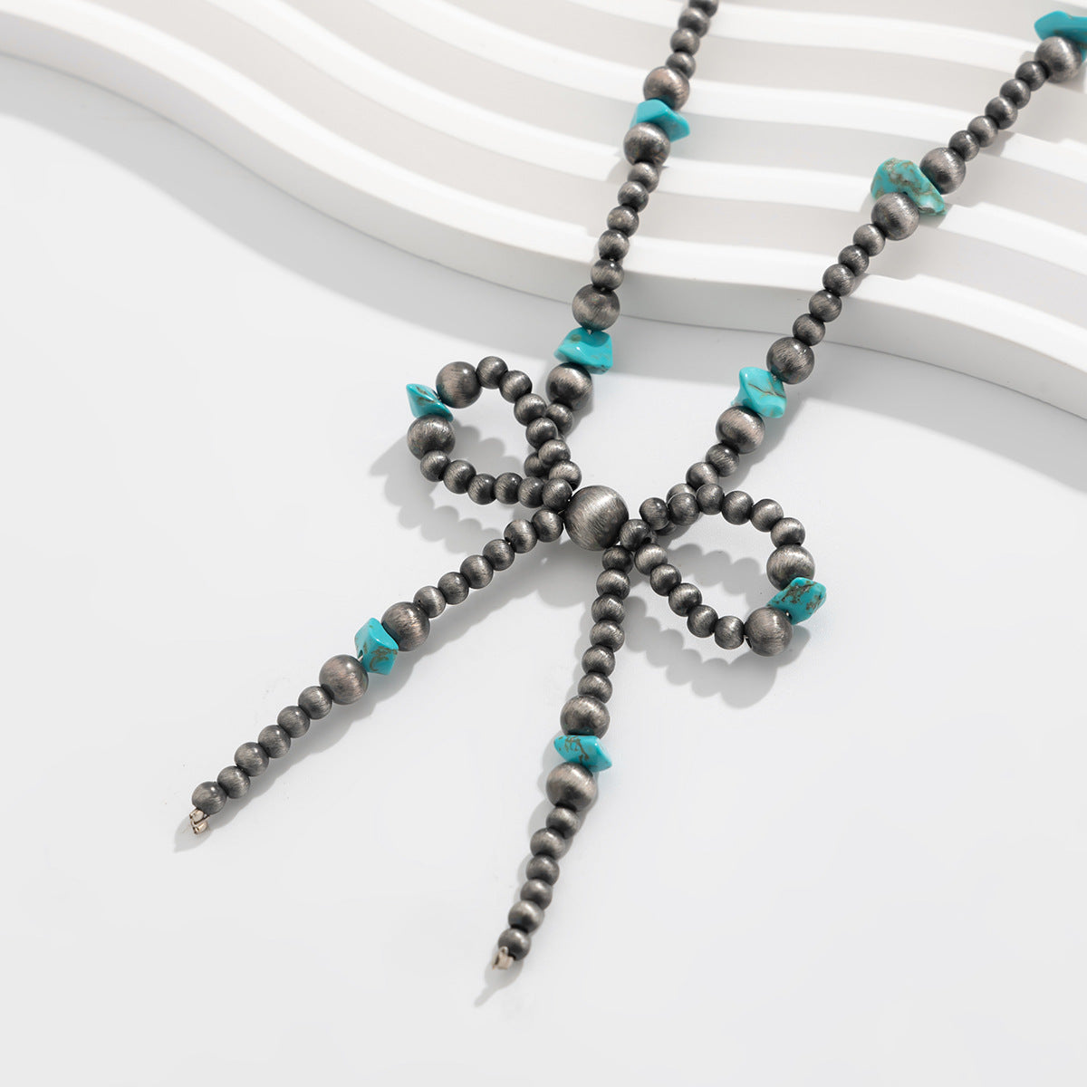 Planderful Vienna Verve Necklace – Handmade Ethnic Turquoise Bow Design
