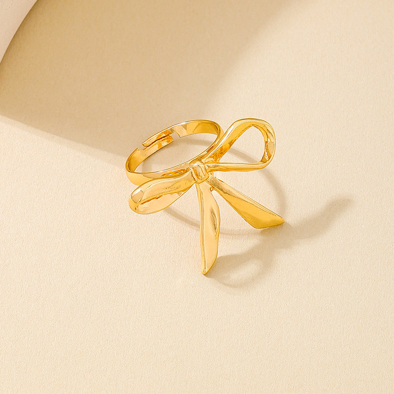 Fashionable Metal Bow Sunflower Ring for Women by Planderful