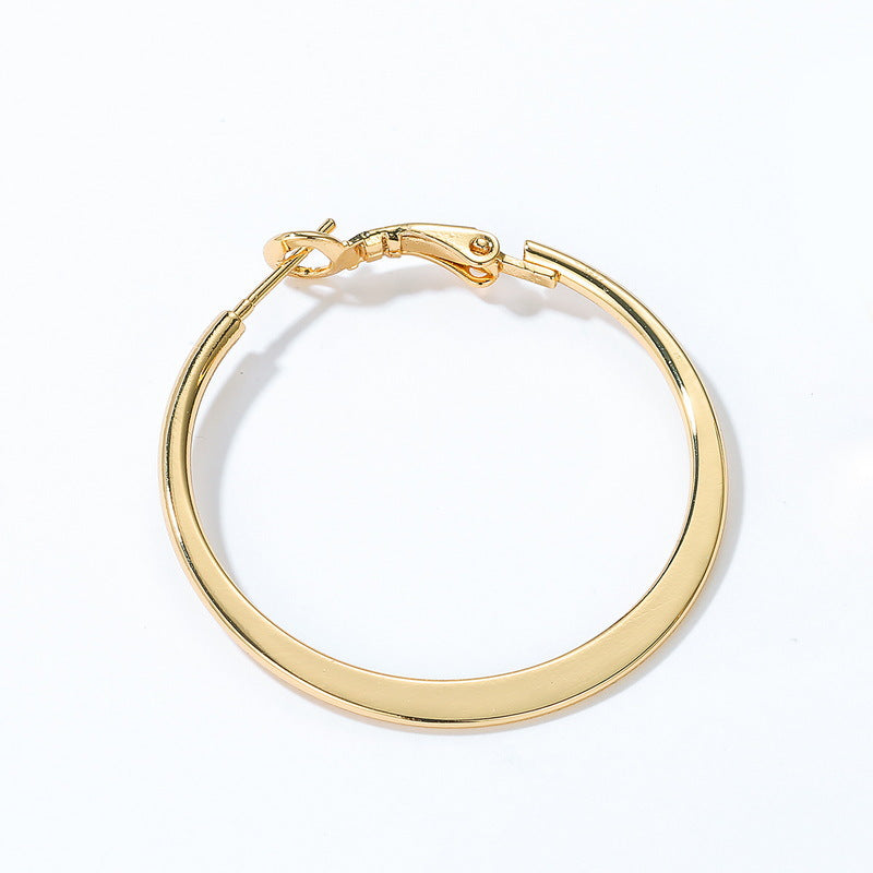 Gold-Tone Curved Metal Hoop Earrings