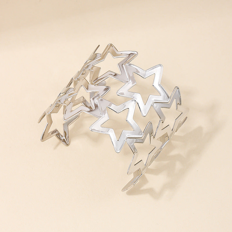 Exaggerated Wide-Face Hollow Star Bracelet in Metal - Vienna Verve Collection