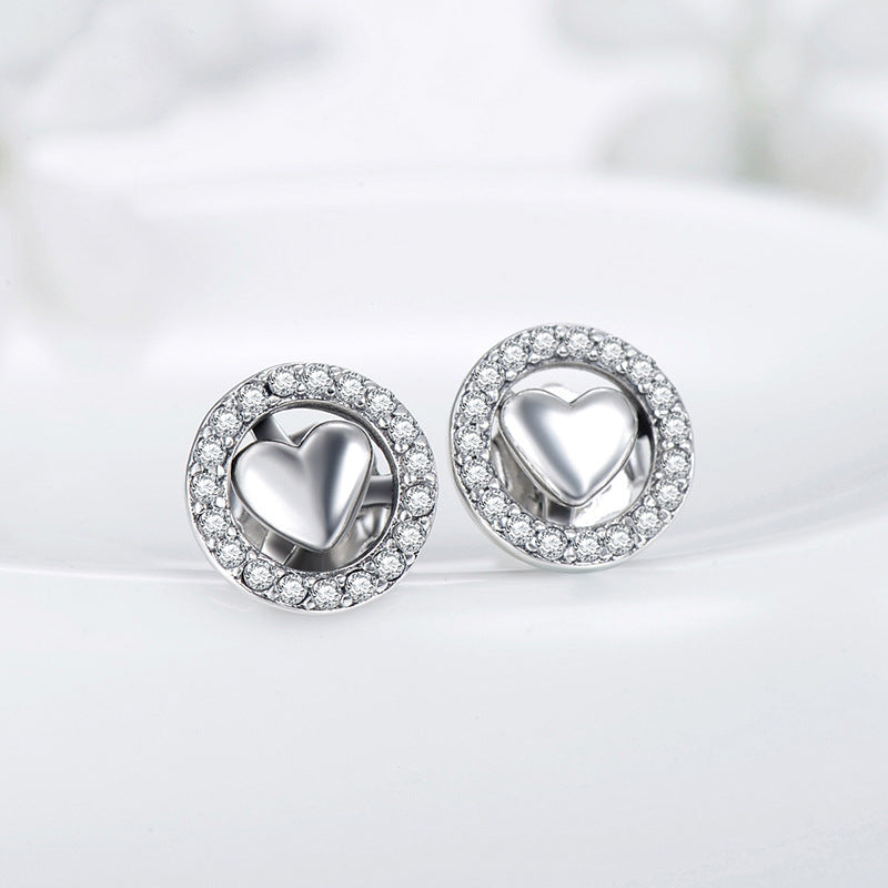 Stylish Sterling Silver Heart-Shaped Stud Earrings with Zircon Accents