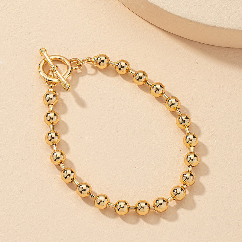 Fashionable Metal Bracelet with Bead Detail - Vienna Verve Collection