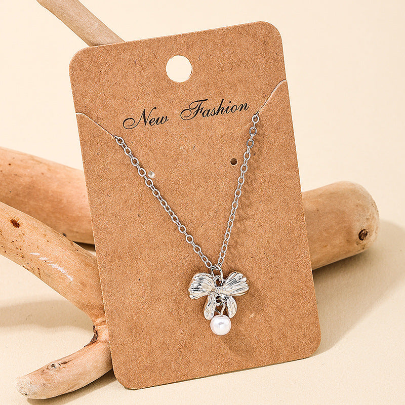 Sweet Bow Pearl Necklace with a Hint of Vienna Verve