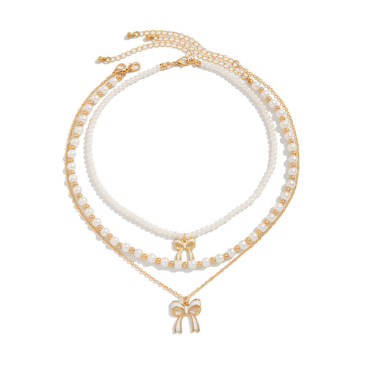 Layered Imitation Pearl Bow Tassel Necklace