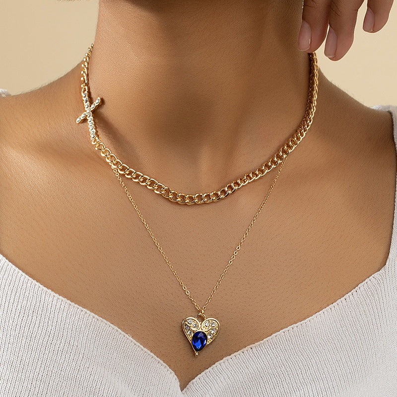 Elegant Double Strand Necklace with Cross Pendant