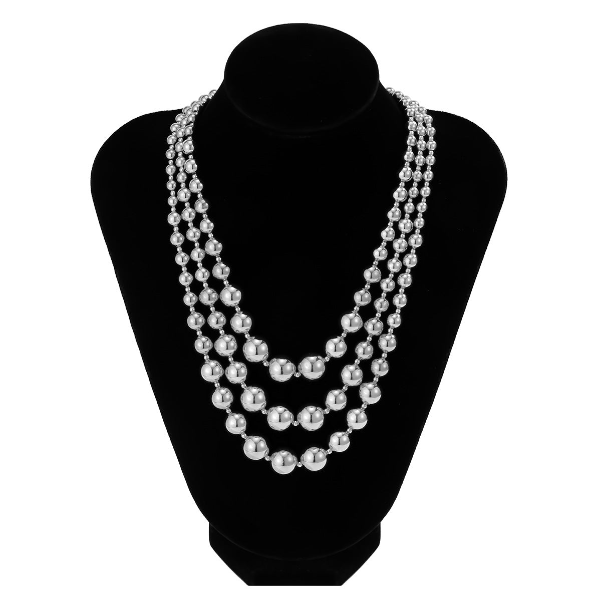 Statement Necklace with Tassel Beads and Geometric Shapes