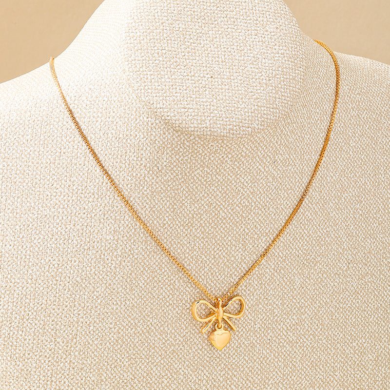 Planderful Vienna Verve Necklace – Elegant Metal Bow Design